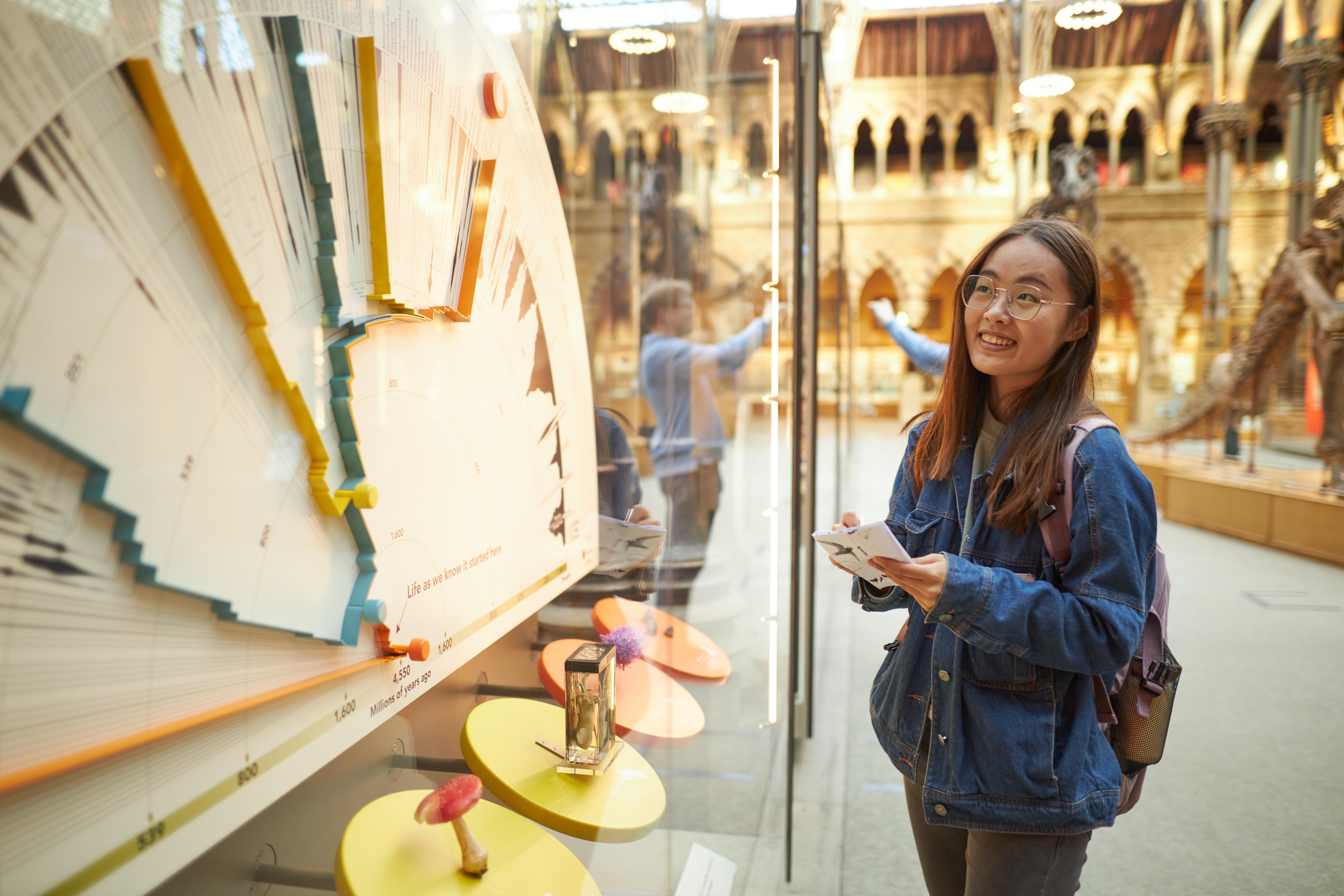 A visitor enjoying one of the new displays at the museum